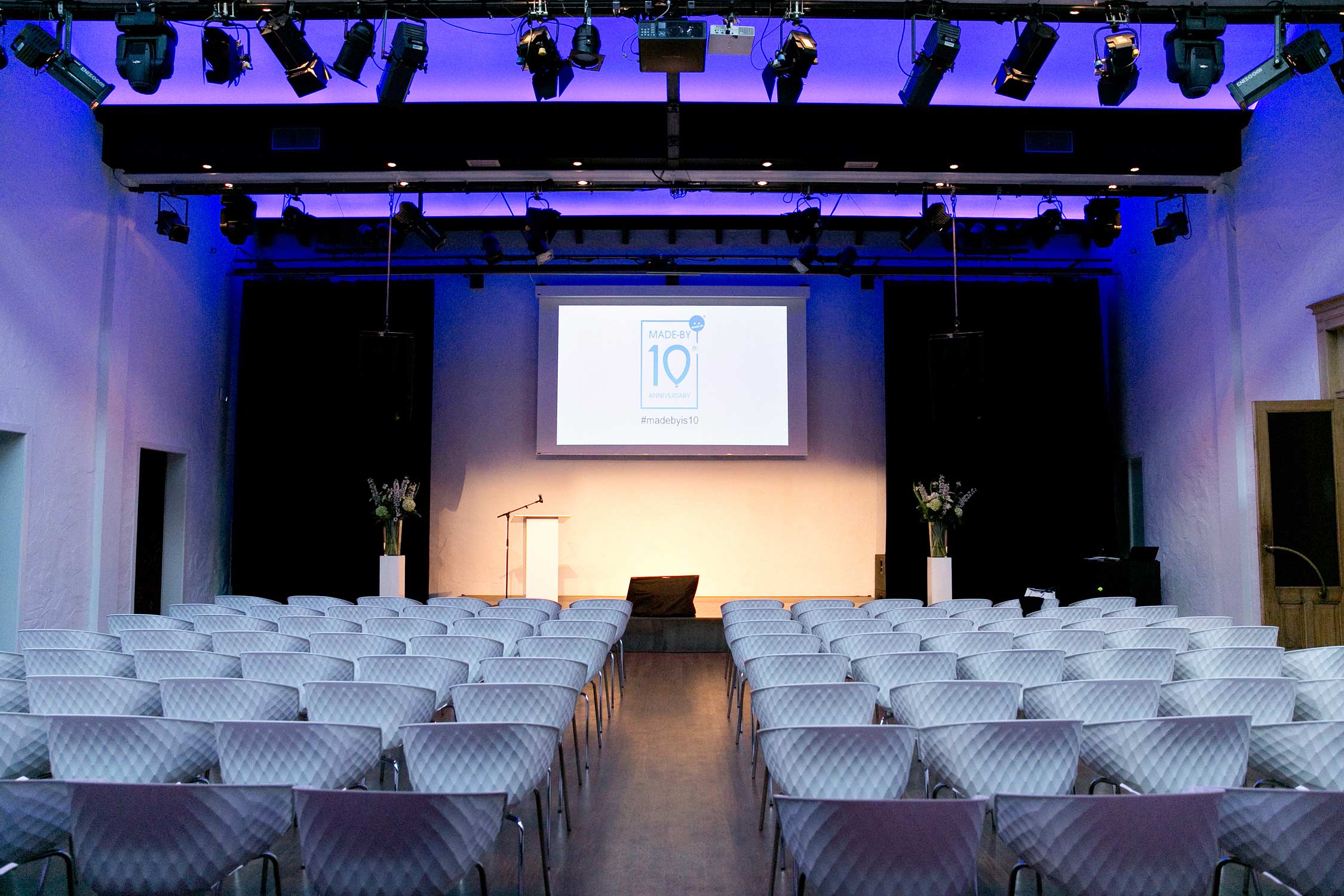 Empty conference venue photography in London.